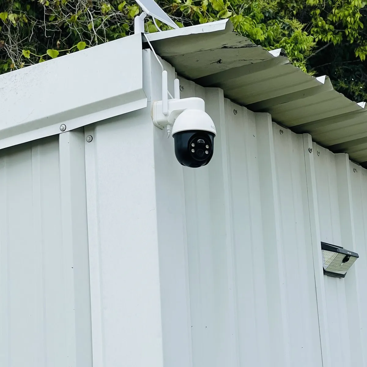 A surveillance camera mounted on the corner of a building at Marion Storage Depot